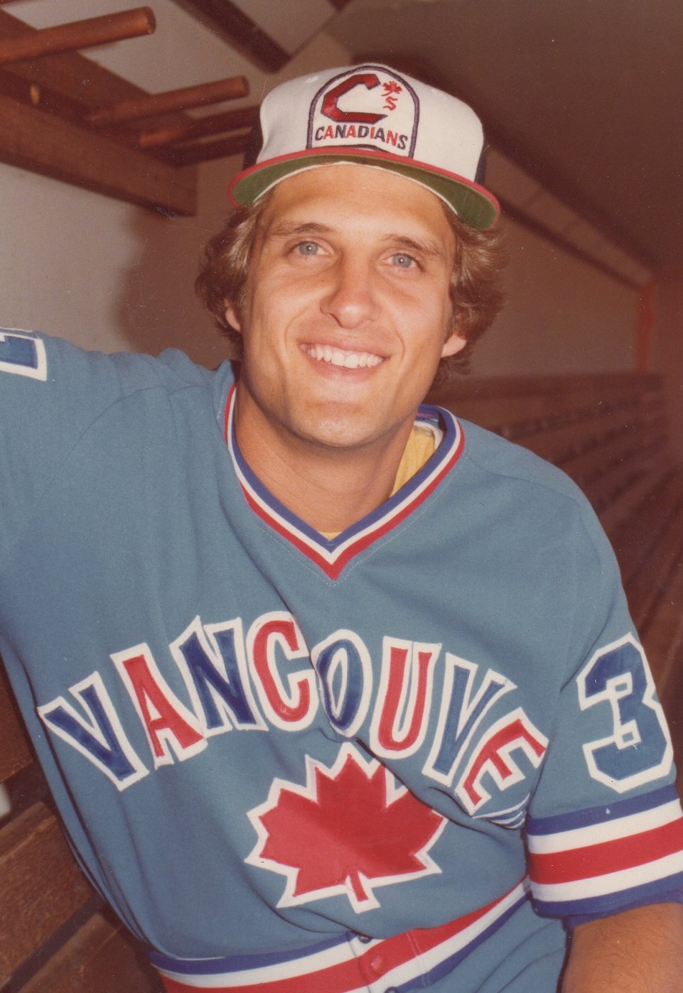 Randy smiling in a Vancouver Canadians uniform and cap